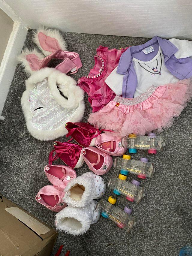 Preview of the first image of Build a Bear clothes and shoes.