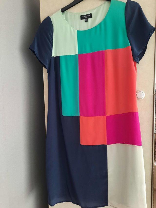 Preview of the first image of Ladies multi coloured silk shift dress.