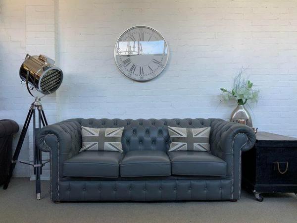 Image 1 of Grey Chesterfield sofa. Armchair & footstool available.