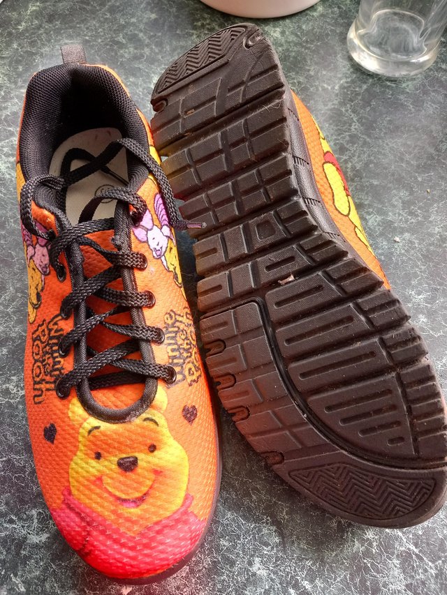 Preview of the first image of Winnie the Pooh canvas shoes,.