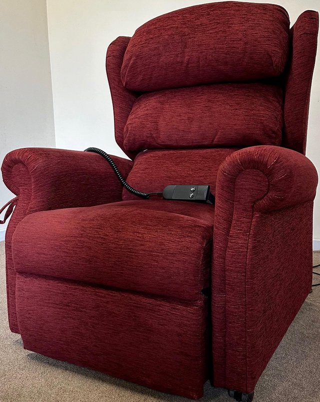 Preview of the first image of PETITE LUXURY ELECTRIC RISER RECLINER RED CHAIR CAN DELIVER.
