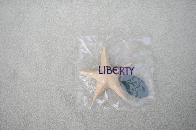Preview of the first image of Liberty Hand Carved Wooden Fragranced Star Fish.