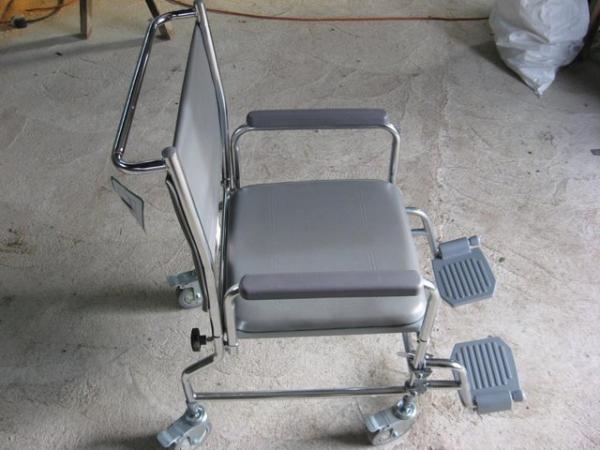 Image 3 of Portable commode doubles as a transfer chair