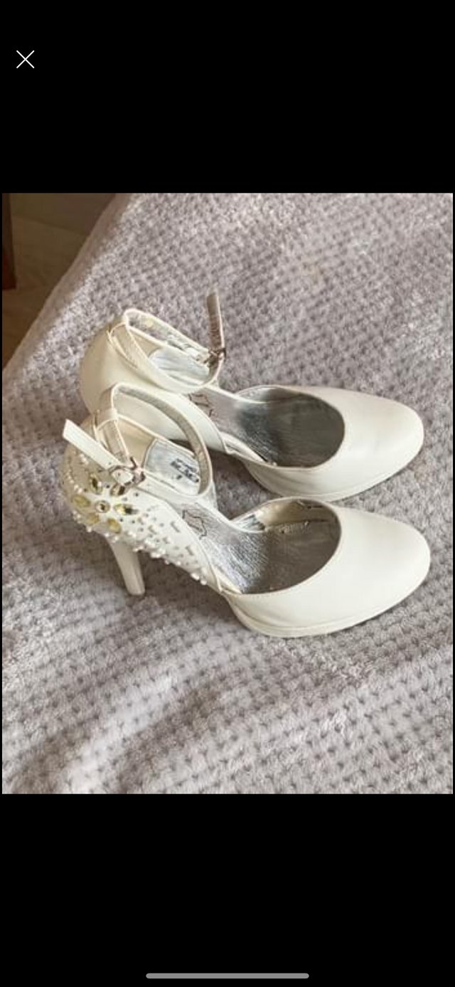 Preview of the first image of Wedding shoes for sale only worn a few hours.
