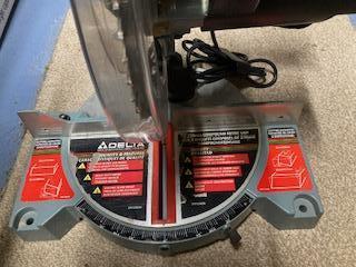 Image 2 of Delta Compound Miter 210 saw, only used a few times