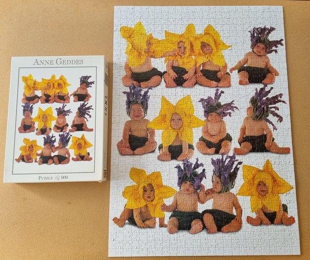 Preview of the first image of 1000 piece jigsaw called SUNFLOWER BABIES by ANNE GEDDES.