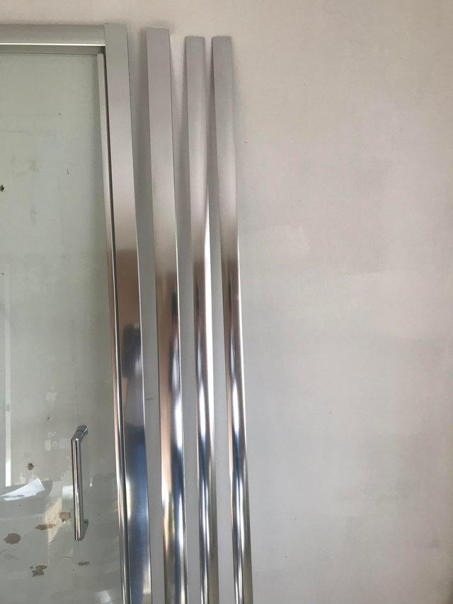 Preview of the first image of MERLYN ESSENCE FRAMED PIVOT SHOWER DOOR.