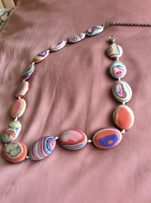 Preview of the first image of Pretty vintage polished stone necklace.