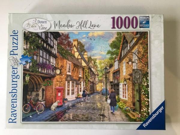 Image 1 of Ravensburger 1000 jigsaw piece titled Meadow Hill Lane.