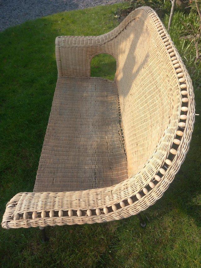 Preview of the first image of Light Brown Wicker Settee.