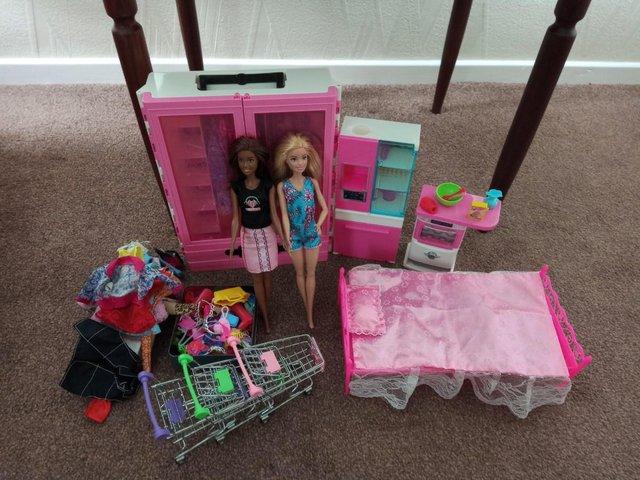 Preview of the first image of Barbie doll bundle with loads of accessories..