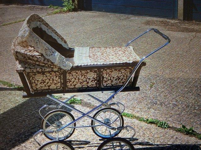 Preview of the first image of 1980’s Vintage, Victorian style Dolls Pram.