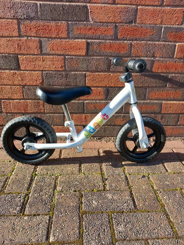 Preview of the first image of Indi Adapt whire Balance Bike.