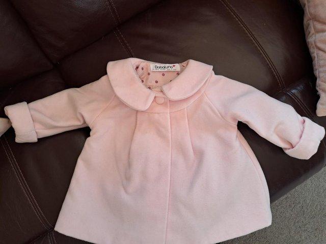 Preview of the first image of Beautiful Pink Baby Coat Worn Once.