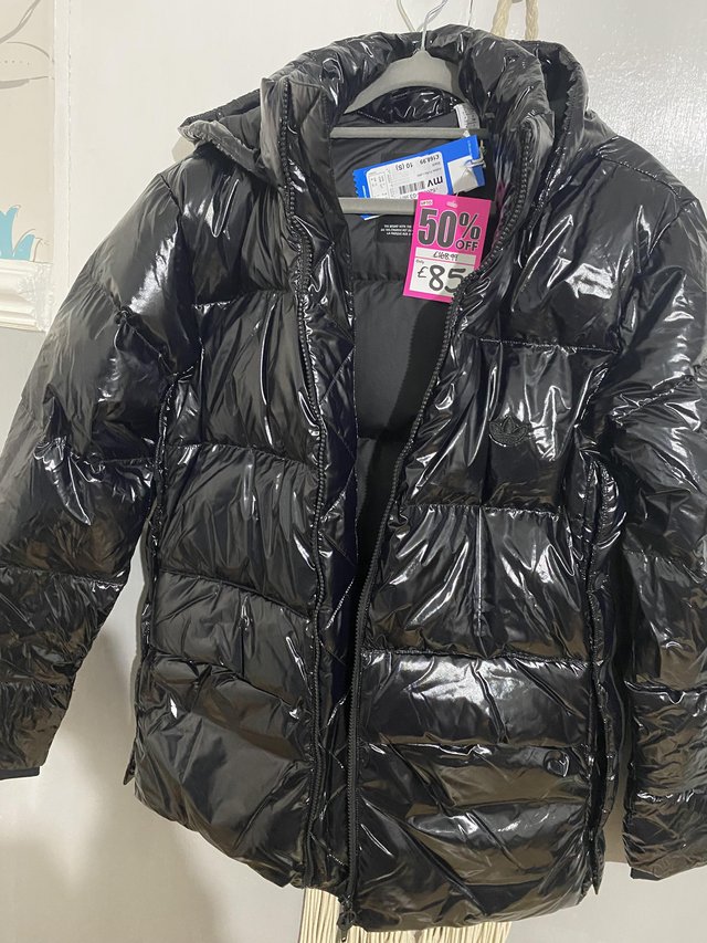 Preview of the first image of Adidas wet look jacket size 10.