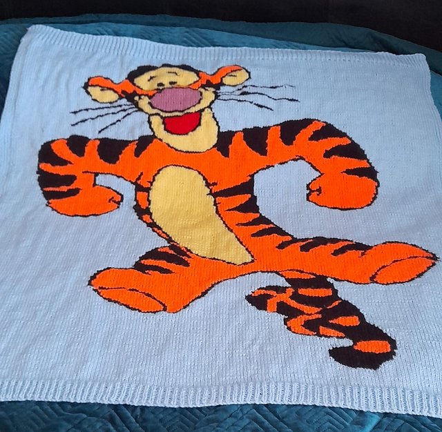Preview of the first image of New hand-knitted tigger blanket.