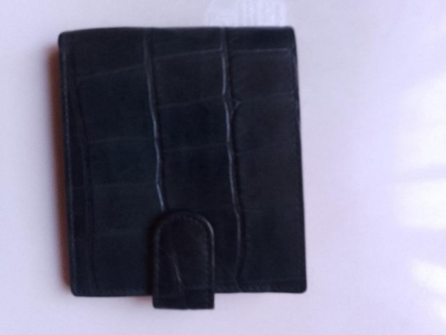 Preview of the first image of Mens cloth wallet - Dark blue. Has zip. Perfect..