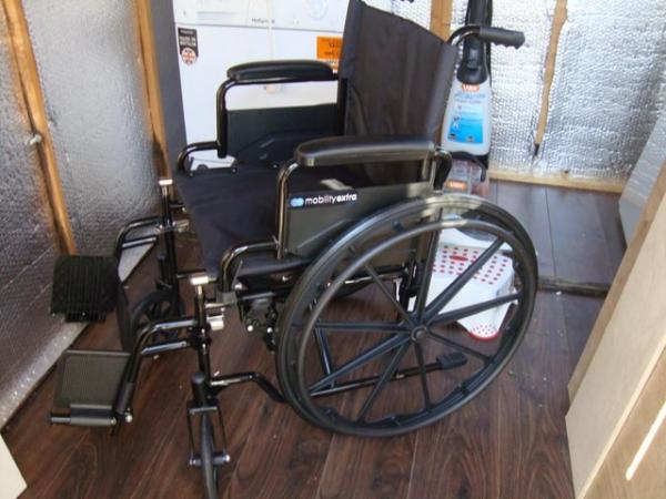 Image 2 of Wheelchair unused bargain for someone, 18" wide seat. Solid