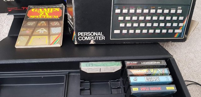 Preview of the first image of ZX Spectrum 16K with case and games.