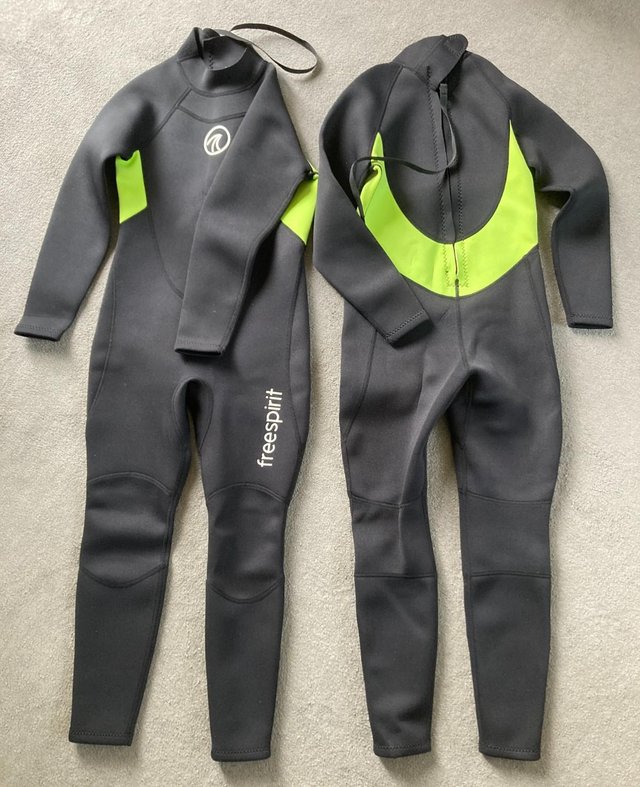 Preview of the first image of 2 Childrens wetsuits age 10-11 years.
