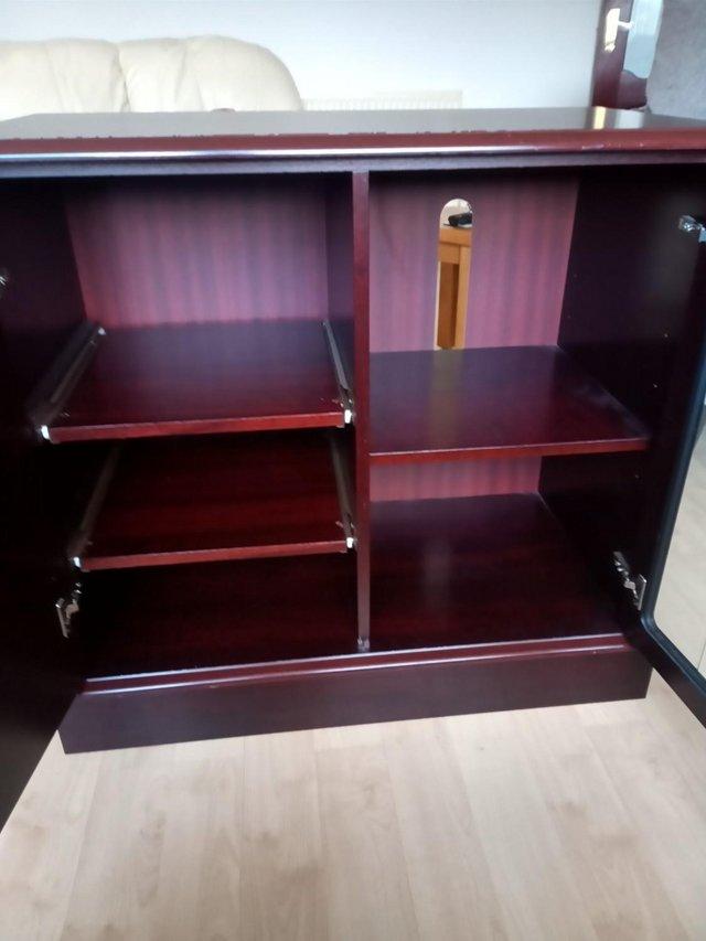 Preview of the first image of Dark Mahogany Cabinet  ,,,,,,,,,,.
