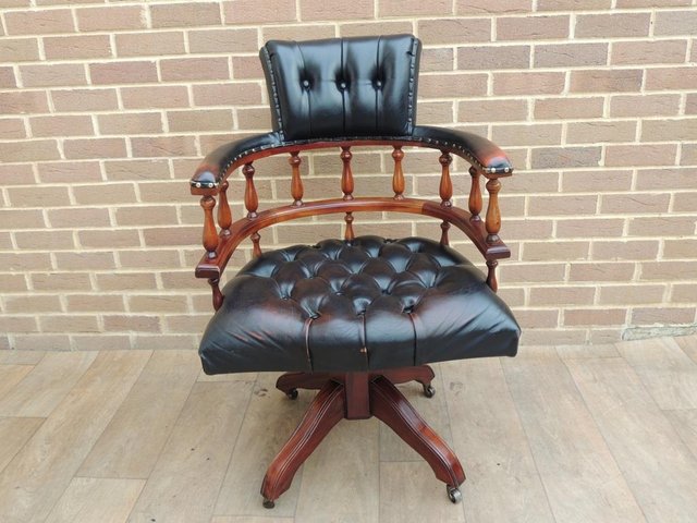 Preview of the first image of Vintage Chesterfield Captains Chair on Brass Castors (Delive.