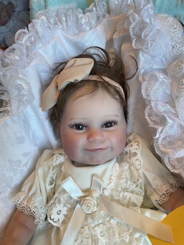 Preview of the first image of Cute and cuddly Chloe really sweet baby reborn doll girl.