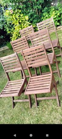 Image 2 of Set of 6 solid teak garden chairs in good condition througho