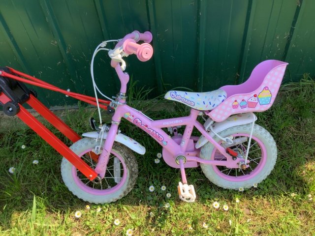 Preview of the first image of Girls bike plus trail angel missing parts (bracket’s).