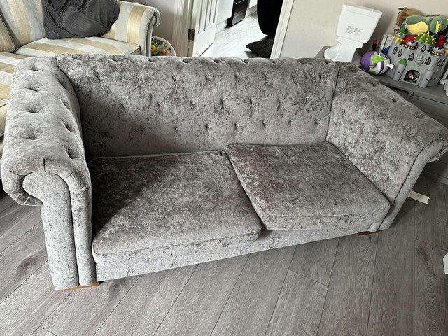 Preview of the first image of Chesterfield style sofa, grey.