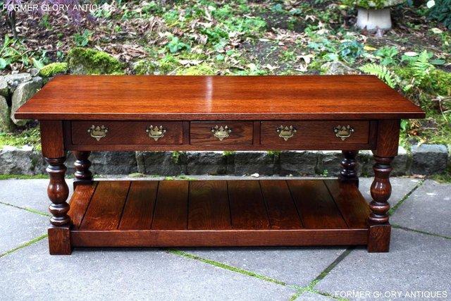 Image 1 of TAYLOR & Co STRESSED OAK THREE DRAWER POTBOARD COFFEE TABLE