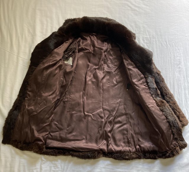 Preview of the first image of Vintage genuine rabbit fur coat.