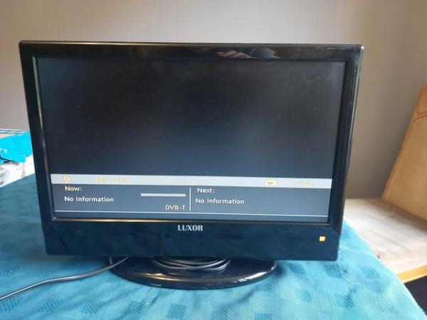 Image 1 of Luxor small television with remote
