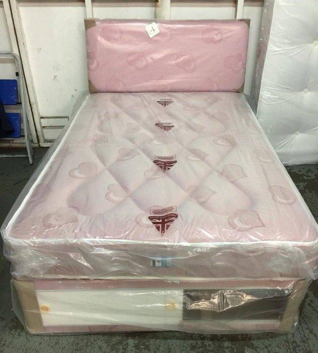 Preview of the first image of 4 FOOT OR DOUBLE PINK LOVE HEARTS SLIDE STORAGE DIVAN BED.