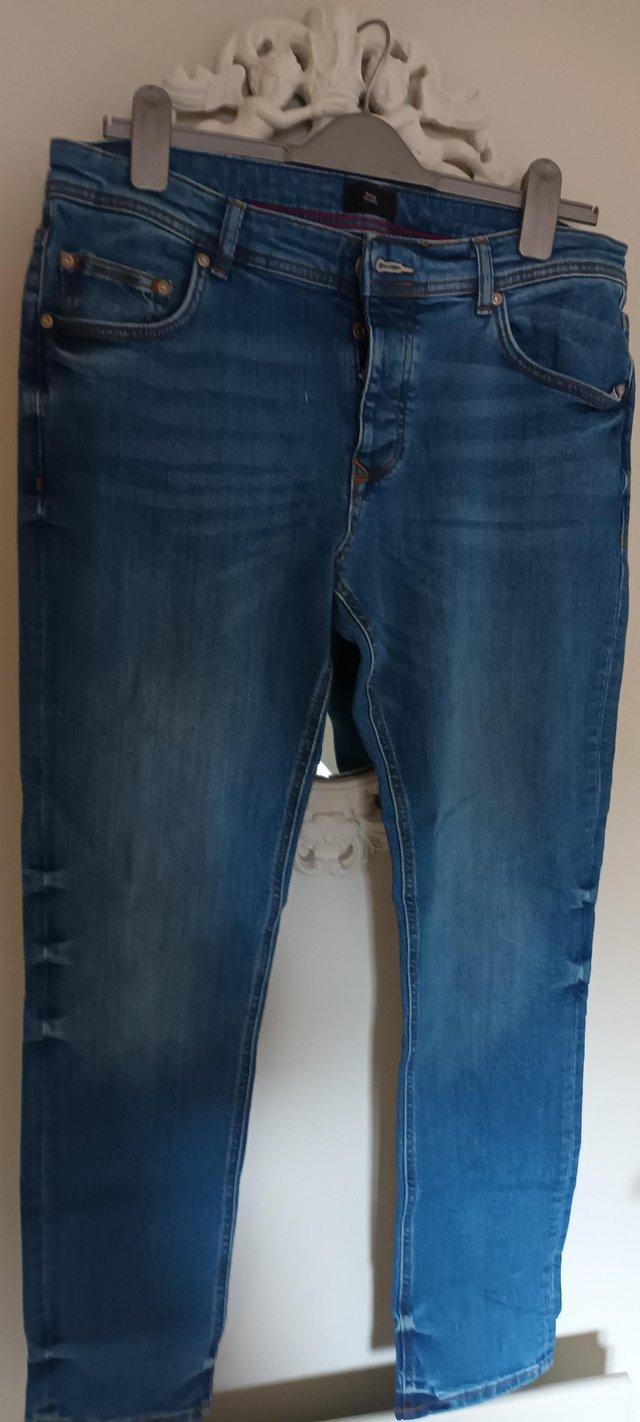 Preview of the first image of River Island mens jeans.