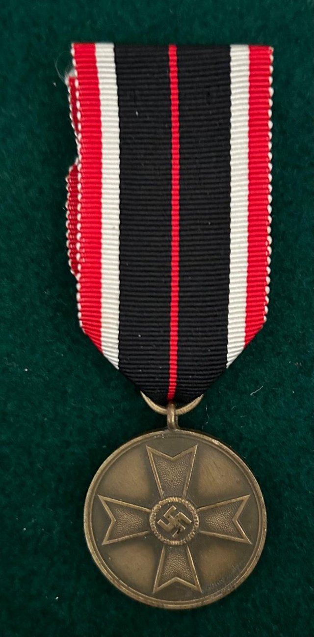 Preview of the first image of WW2 German War Merit Medal 100% Genuine and original.