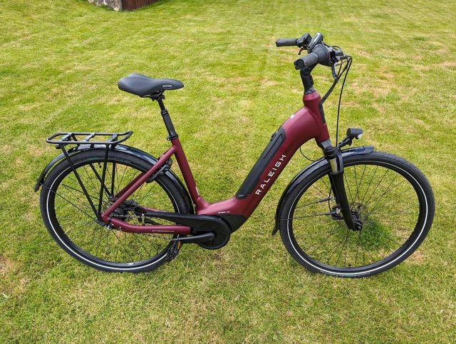 Preview of the first image of Raleigh Motus Tour Urban e-Bike - 7 Speed - Only 63 Miles.