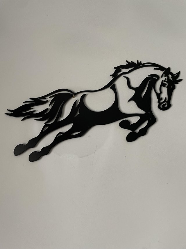 Preview of the first image of Jumping horse wall plaque.