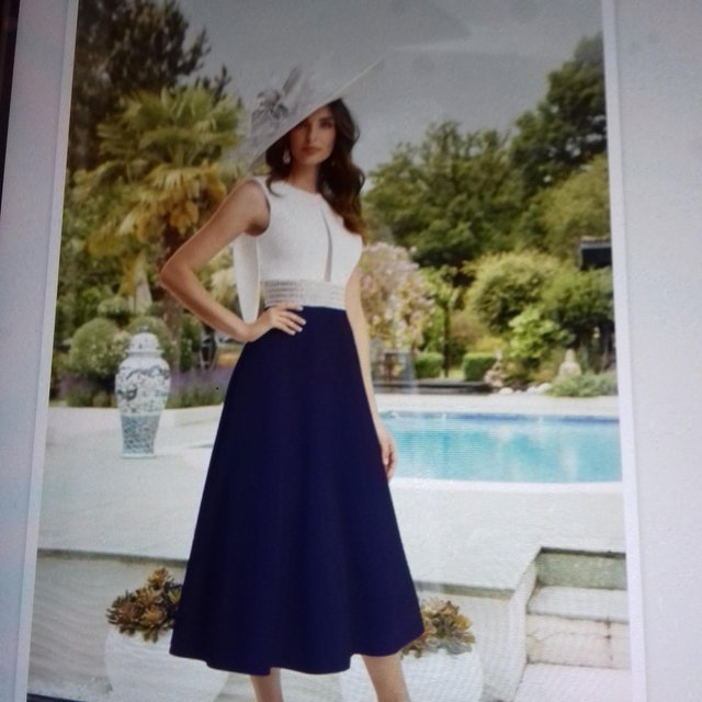 Preview of the first image of Brand new ronald joyce  ivory and navy dress size 16.