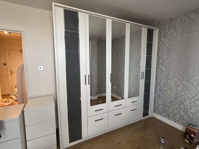 Preview of the first image of Matt White Wooden Wardrobe with Mirrors.
