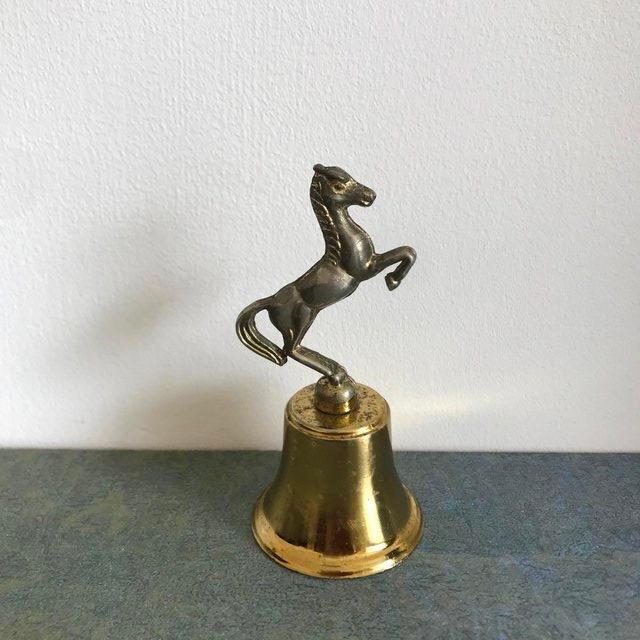 Preview of the first image of Vintage brass plated horse bell. No clapper, repaired.