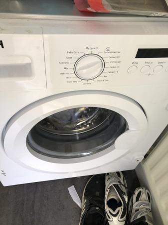 Image 2 of Bush integrated washing machine.