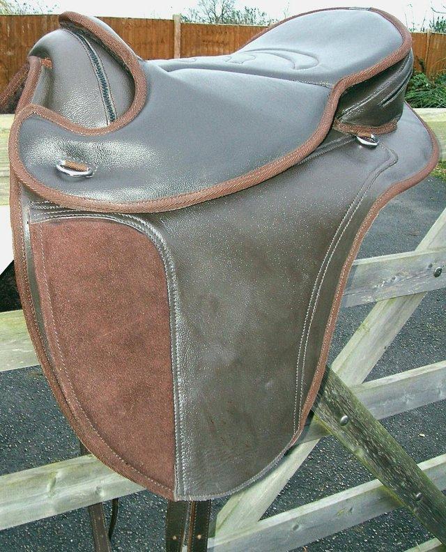 Preview of the first image of Treeless Saddle English All Purpose Brown Leather & Suede.