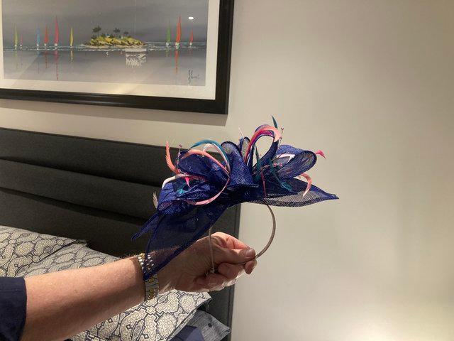 Preview of the first image of Stunning bespoke cobalt blue fascinator.