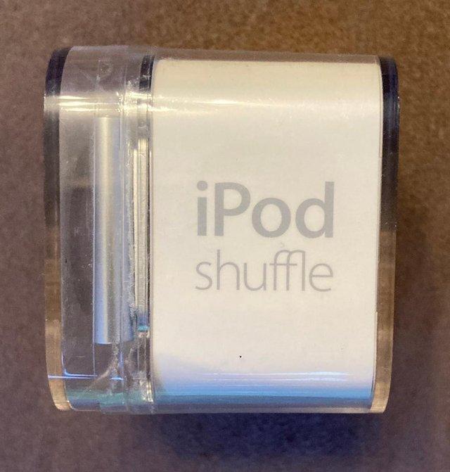 Preview of the first image of Ipod Shuffle 4th Generation – still in sealed packaging.