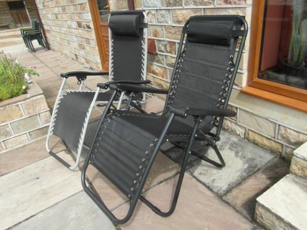 Image 1 of 2 zero gravity chairs folding chairs used a few times