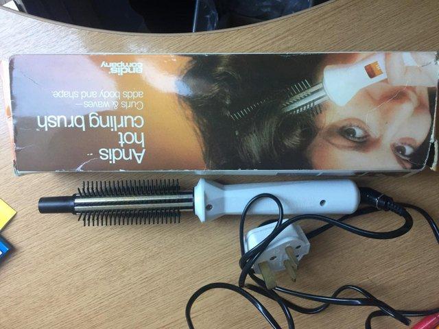 Preview of the first image of ANDIS Hot Curling and Styling Brush.