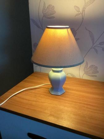 Image 2 of Bedside Light. Pale blue base, cream shade.