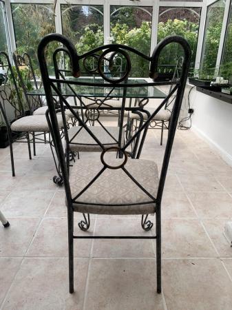 Image 1 of Glass Table and 6 chairs cushioned