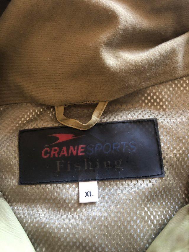 Preview of the first image of Crane fishing jacket as photos.  Size xl with many pockets a.